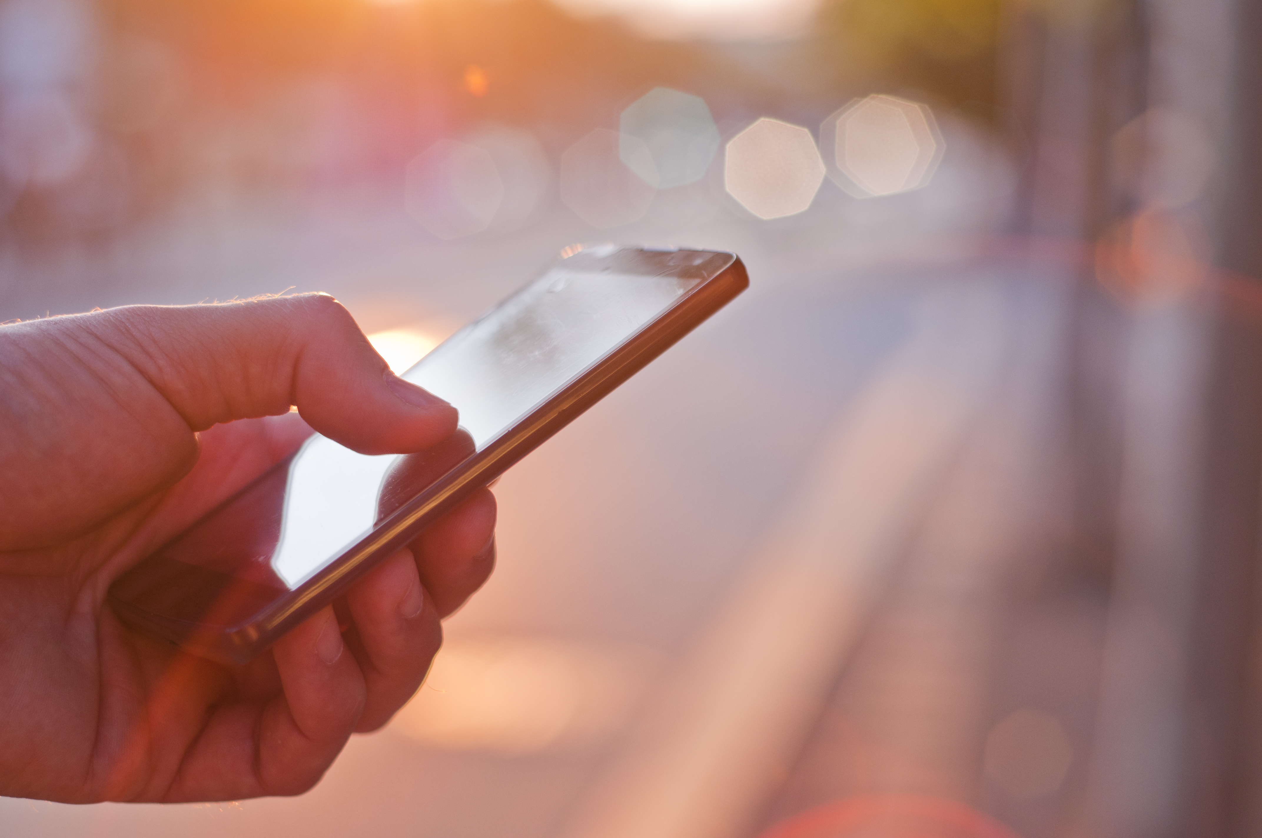 man-using-mobile-smartphone.jpg